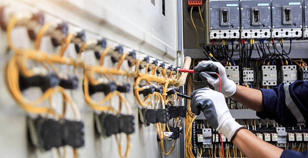 Professional Electrician technician working in Hauser, ID